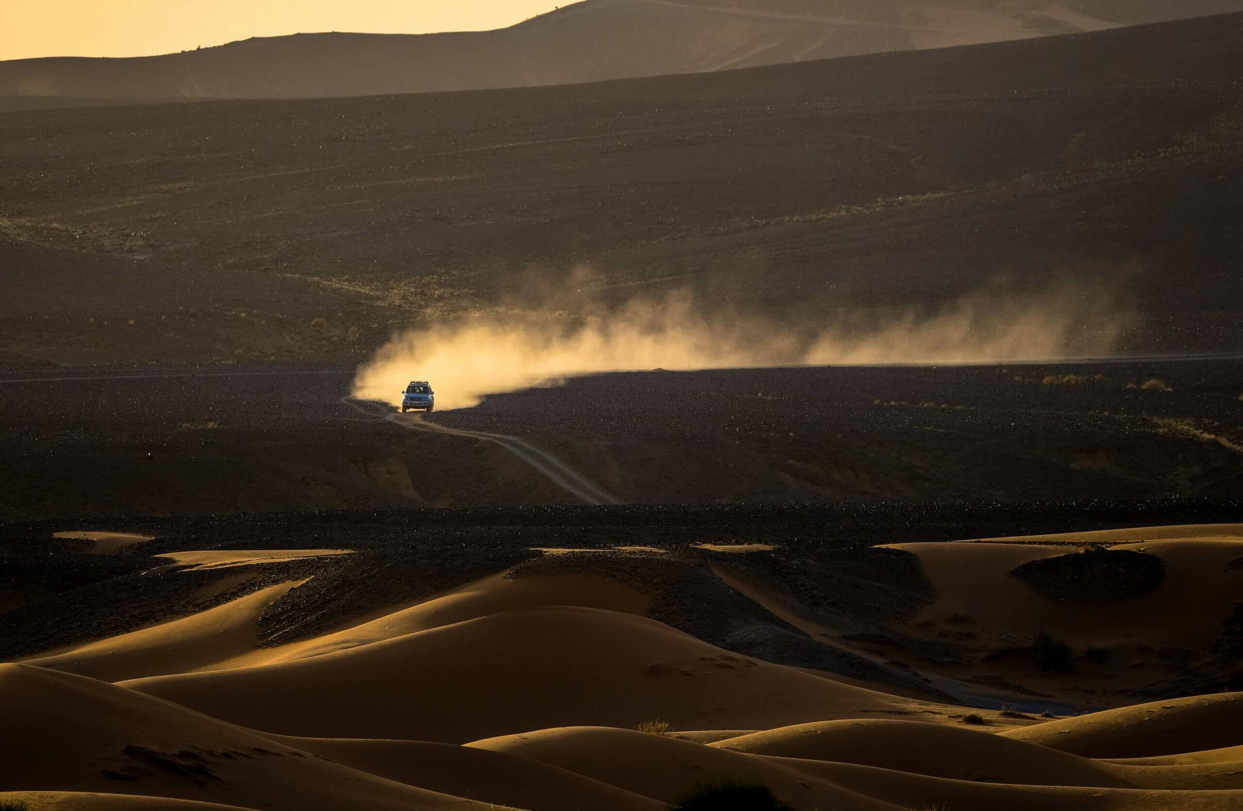 jeep cruising in desert